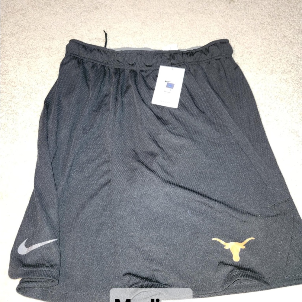 Nike Black Athletic Shorts with Gold and Silver Accents